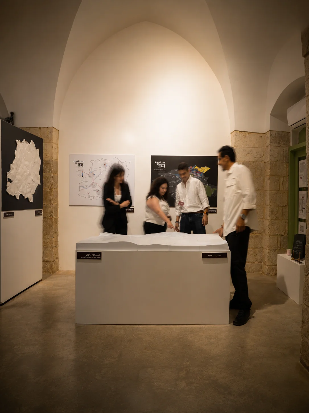 Visitors exploring the Saffuriya exhibition installation